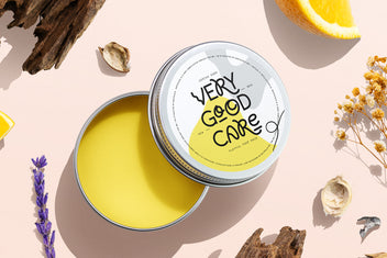 Very good care tin label mockup in Poppy Bonfire display font on blush with lemon and flowers