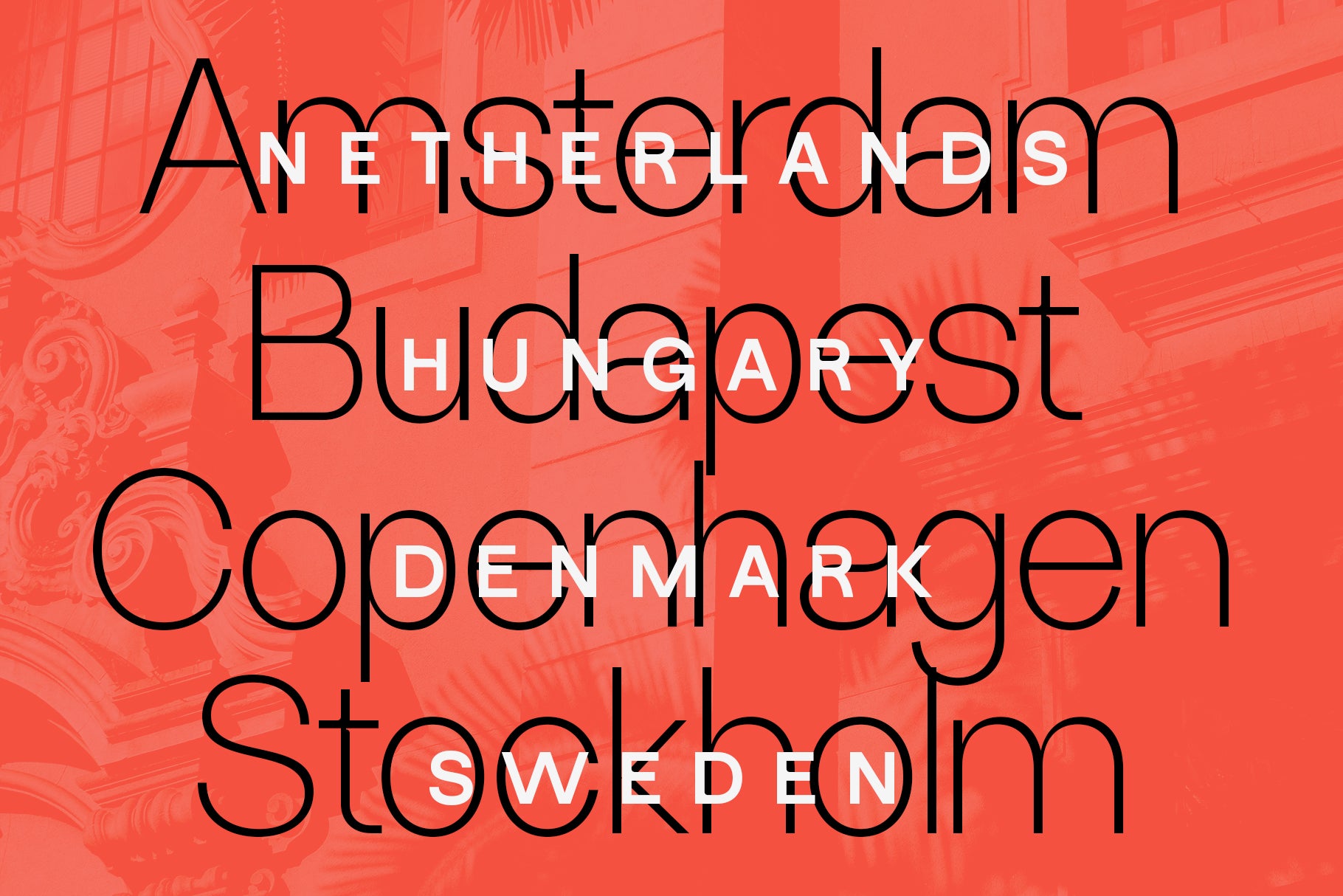SLTF Ryecroft specimen on a coral red ground with a faint architectural photograph showing through. Four city names - Amsterdam, Budapest, Copenhagen and Stockholm - are set very large in the thinnest weight in black outline. Overlapping them in bold white letterspaced capitals are the matching countries: Netherlands, Hungary, Denmark and Sweden. The two layers cross without either becoming unreadable.