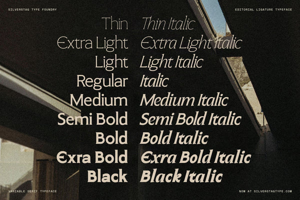 SLTF Arcilla complete weight specimen — all 18 fonts listed from Thin to Black in both upright and italic cuts, set in white on a dark moody architectural photograph. Each weight is rendered at display size showing the progression from the finest hairline of Thin to the commanding density of Black Italic.
