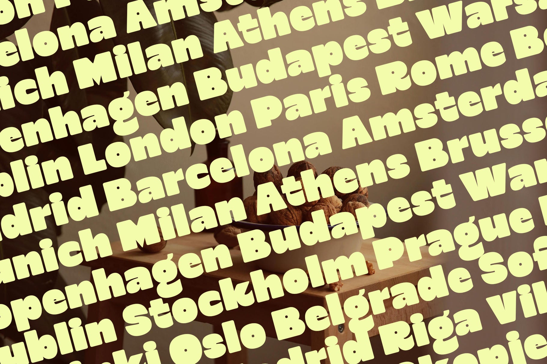 SLTF Curo heavy display sans serif - European city name specimens including Madrid in yellow