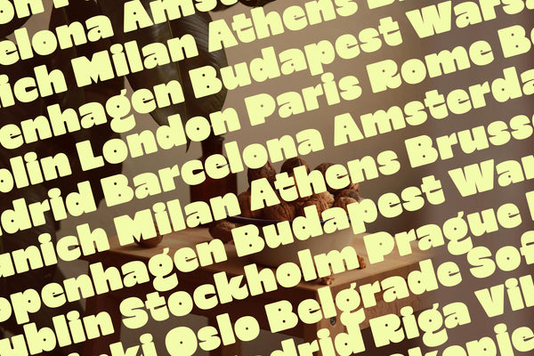 SLTF Curo heavy display sans serif - European city name specimens including Madrid in yellow