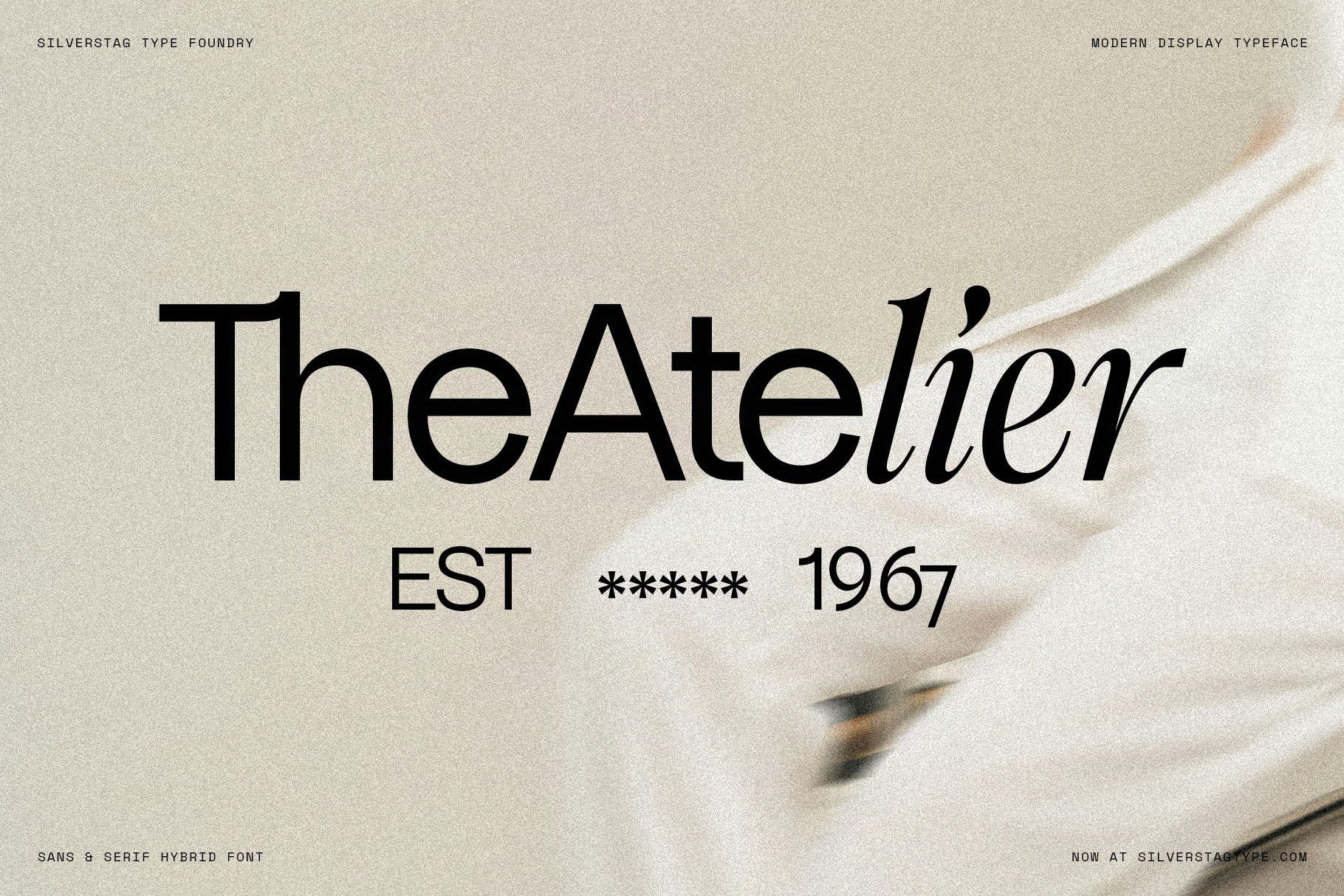 SLTF Dessign Maison hybrid serif display - TheAtelier est 1967 wordmark on draped fabric