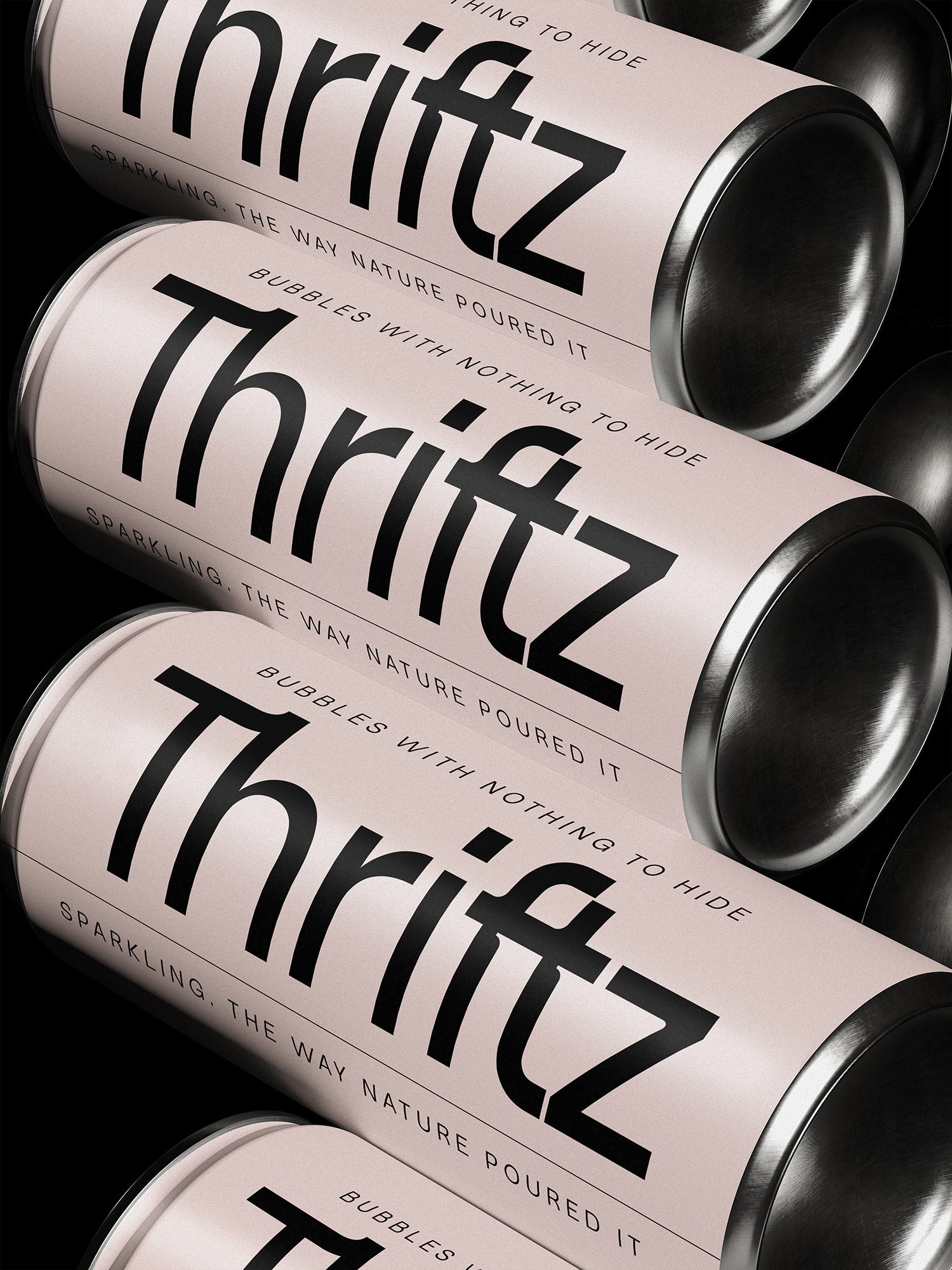 SLTF Ryecroft packaging mockup. Three blush pink drinks cans with brushed metal ends lie diagonally across a black ground. The brand name Thritz is set very large in a heavy weight down the length of each can, with the f and t drawn tight together. Curved letterspaced capitals wrap the rims reading sparkling, the way nature poured it, and bubbles with nothing to hide.
