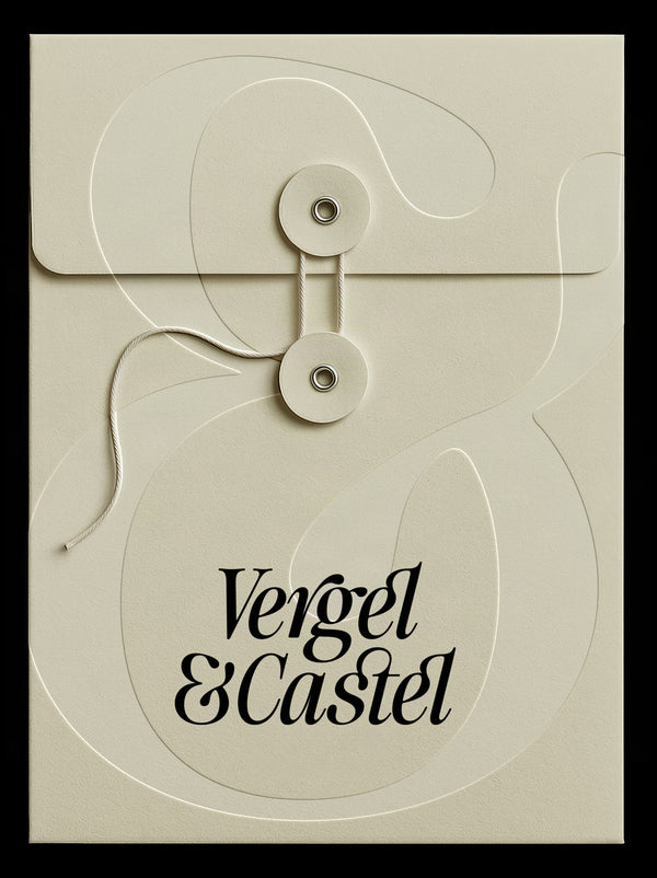 Vergel and Castel string-tie envelope mockup in SLTF The Brachen, dark calligraphic serif on a cream embossed paper envelope against black