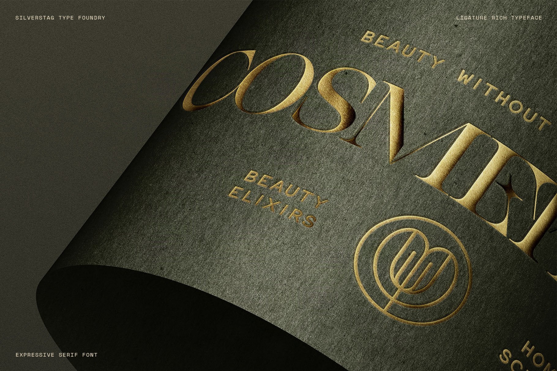 Cosmetics wordmark in gold foil SLTF Spanish Archer lettering on dark green paper