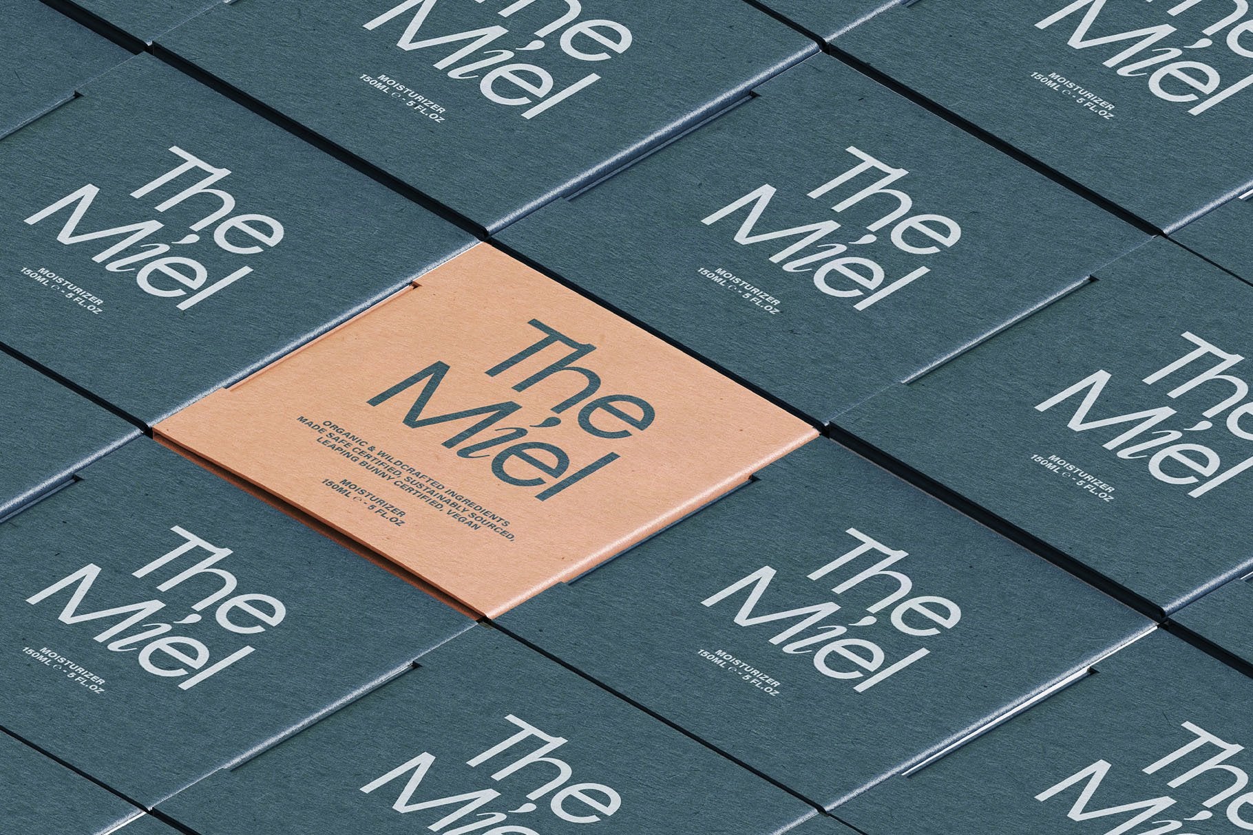SLTF Dessign Maison hybrid serif display - The Miel business cards on a teal surface