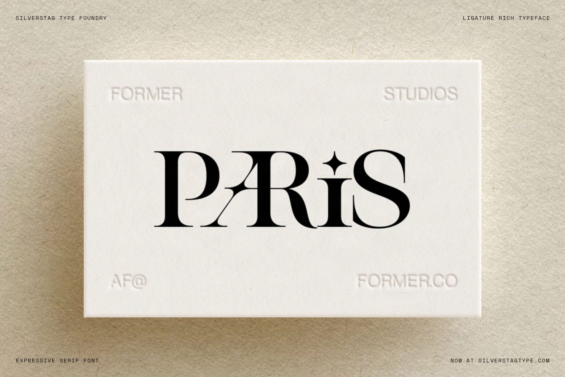 Paris wordmark in SLTF Spanish Archer on an embossed Former Studios business card