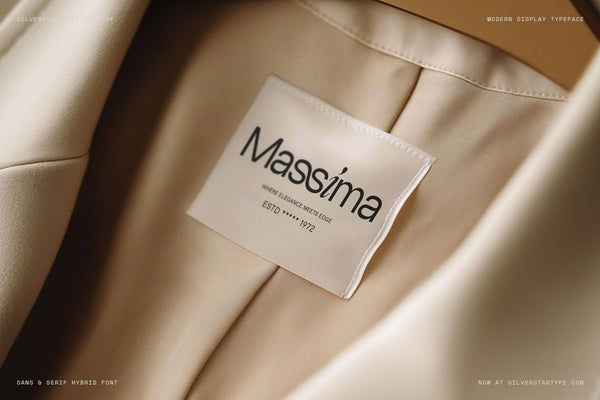SLTF Dessign Maison hybrid serif display - Massima clothing label on a beige garment
