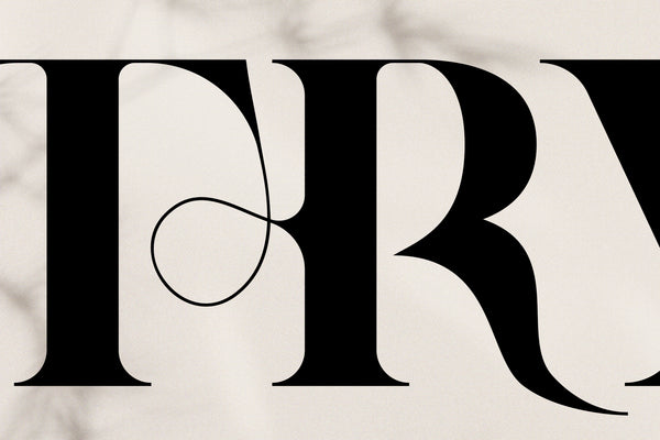 RATHER RISQUE - Ligature Serif Font