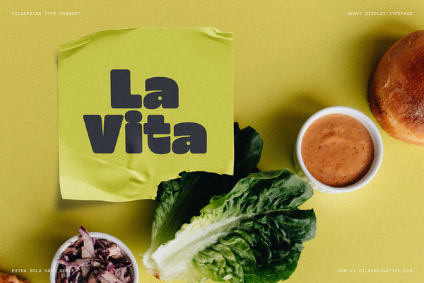 SLTF Curo heavy display sans serif - La Vita lettering on an olive background with fresh food